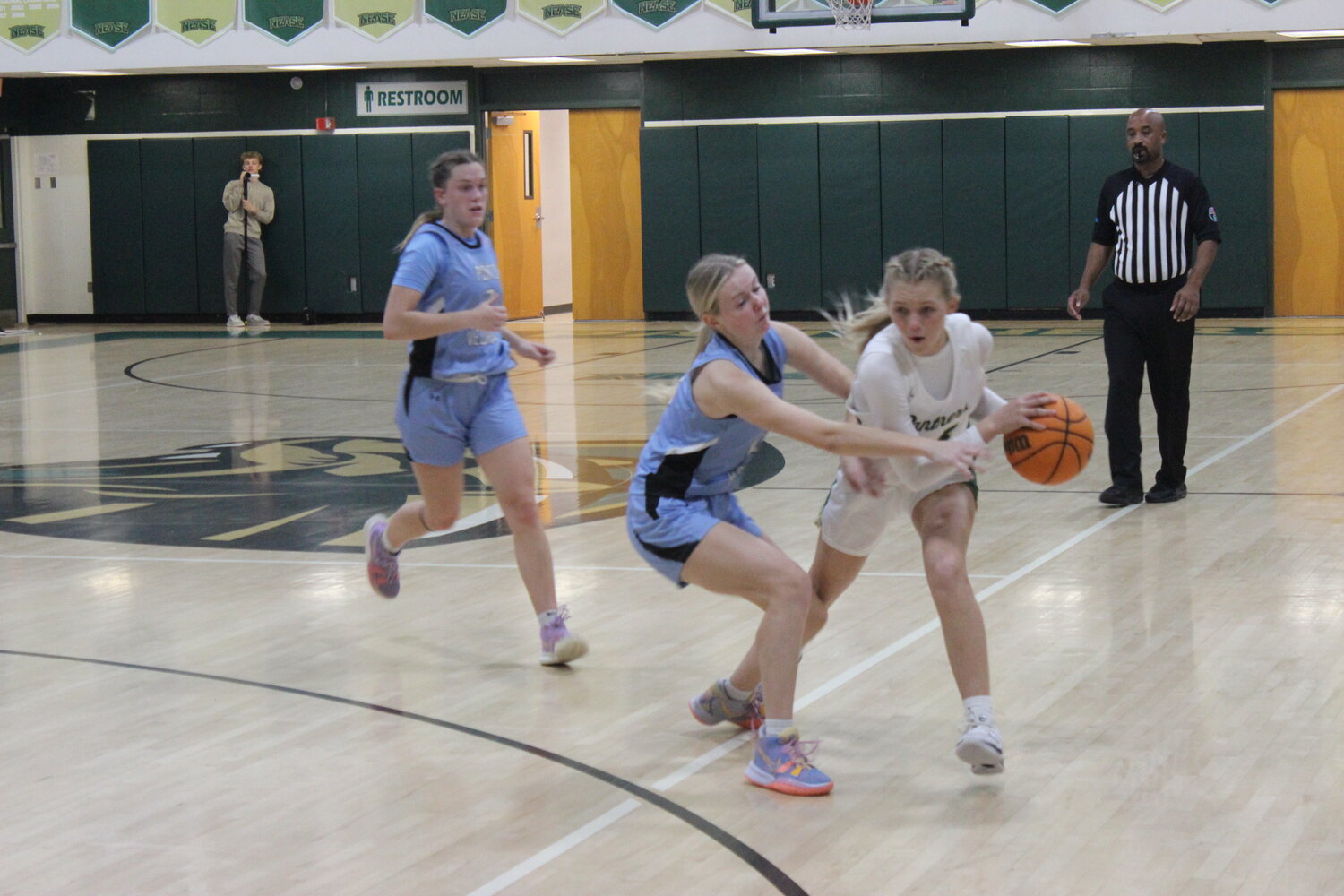 Sage Pytel of Nease attempts to dribble past Arden Doherty of Ponte Vedra during a contest between the two teams on Jan. 11.